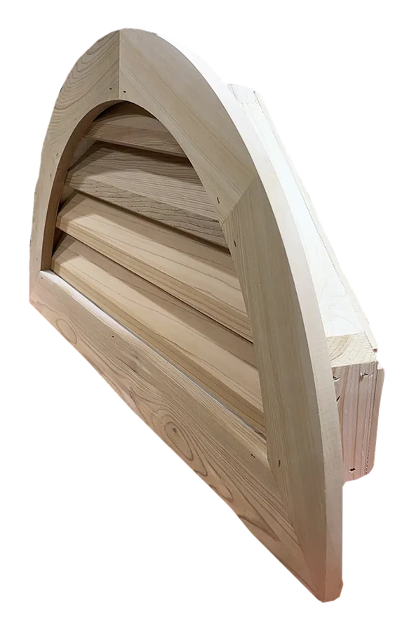 Rear angle of a cedar half-round gable vent, showing the jamb framing behind the louvers