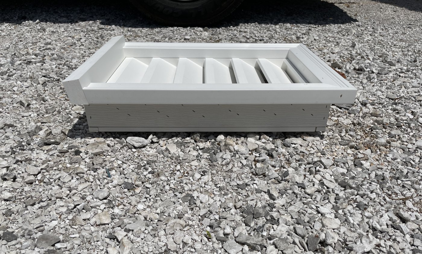 PVC rectangle gable vent with a sill: beveled drip-edge trim along the bottom