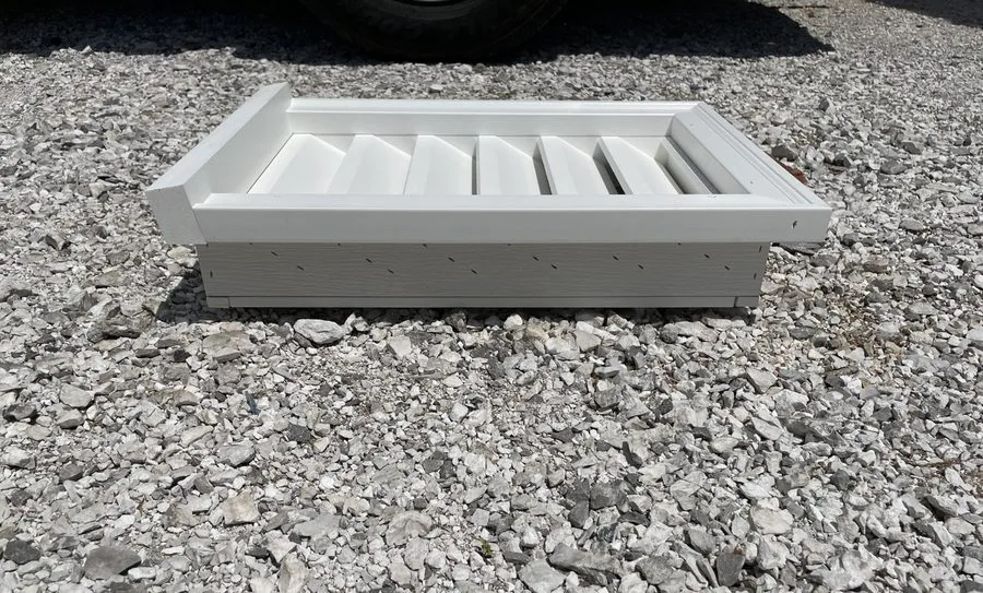 PVC rectangle gable vent with a sill: beveled drip-edge trim along the bottom